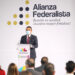 Alianza Federalista en un acto político en Michoacán con un orador y audiencia presente.