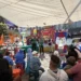 Espectáculo infantil con personajes de caricaturas y actividades en un evento al aire libre en Méxic.