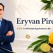 Eryvan Pires, CEO de FruitMarket Agribusiness BV, en una imagen profesional con fondo de frutas tropicales y vegetales fresco.