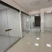 Interior de sala de hemodiálisis en construcción en La Piedad, con paredes blancas y suelo brillante, sin equipos instalados.